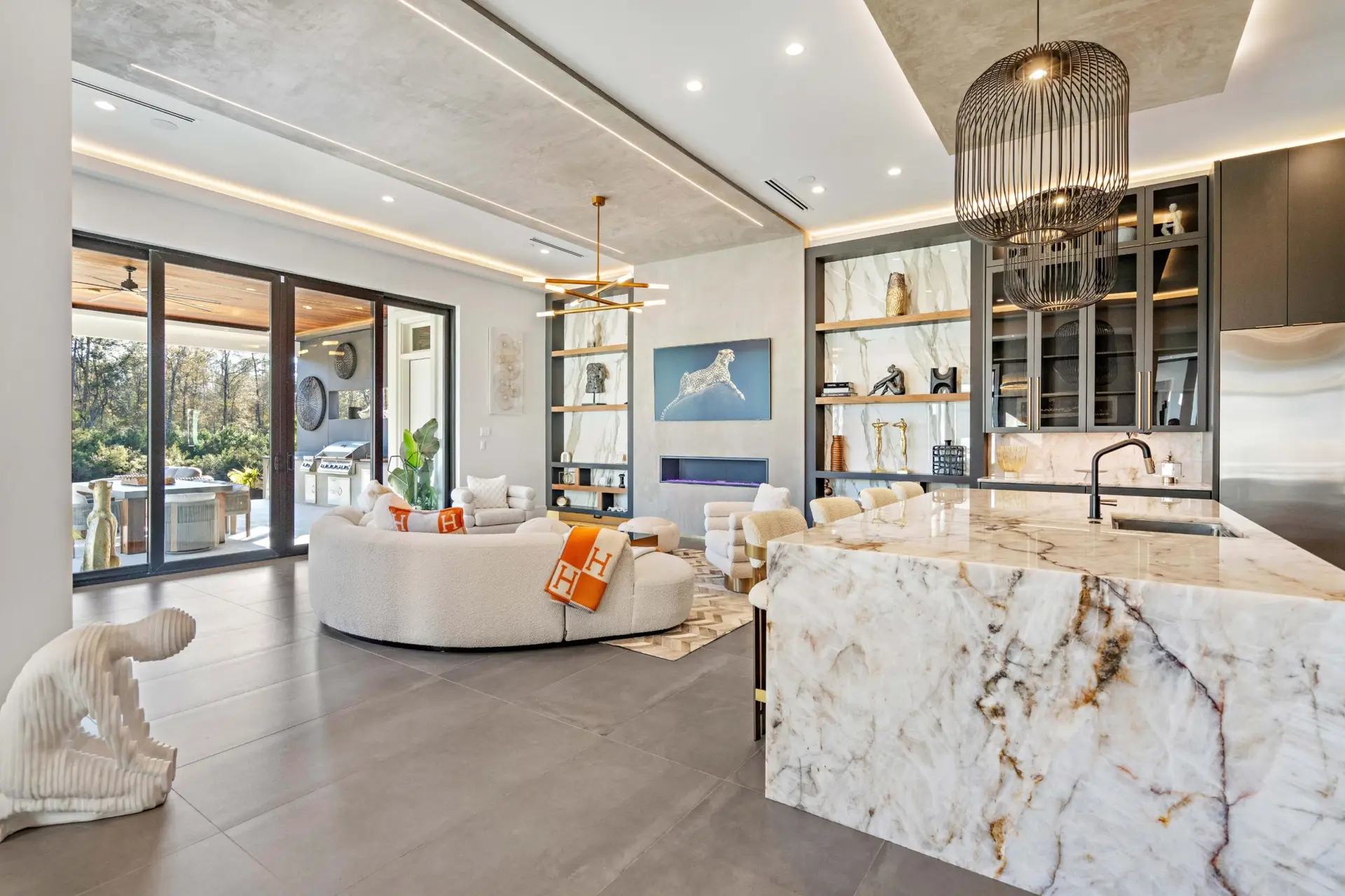 Smart luxury kitchen and living space with integrated technology in a Troyer Builders custom home