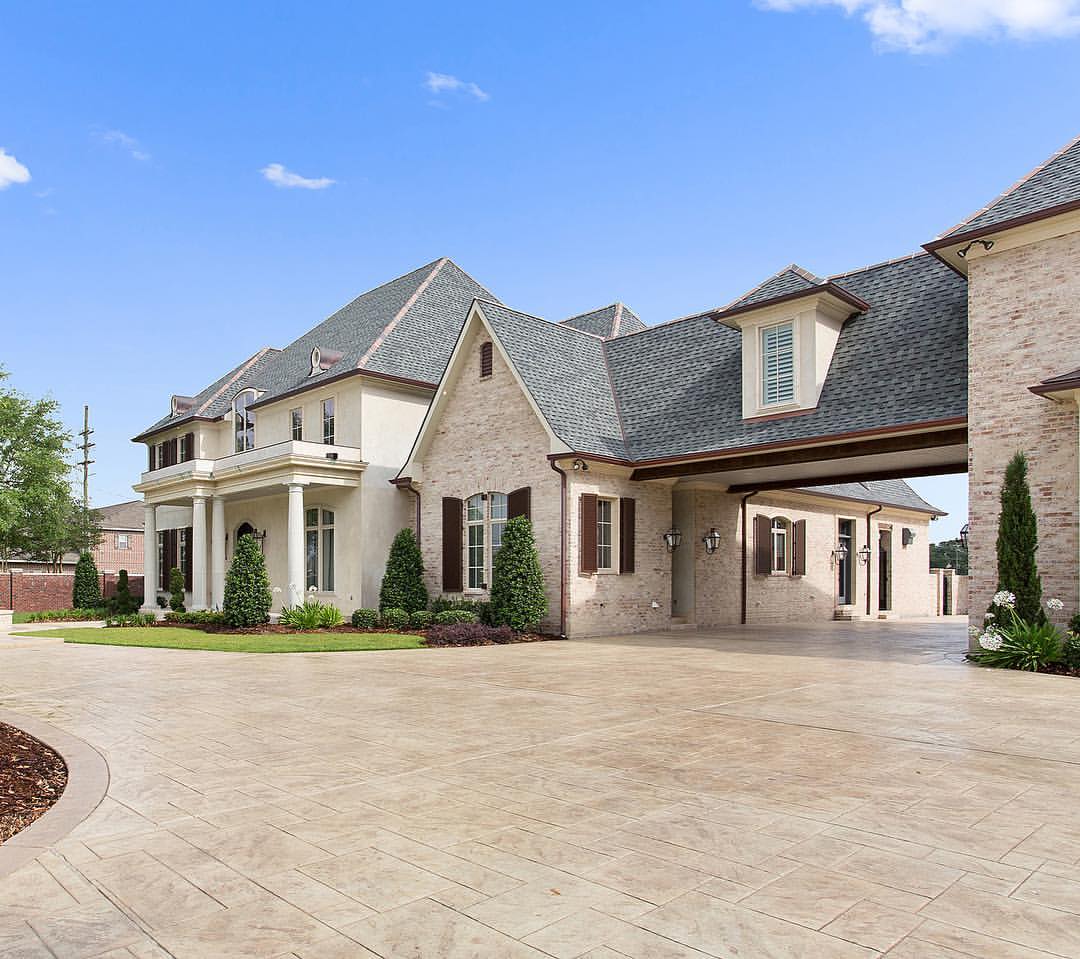 Storm-ready luxury custom home exterior in South Louisiana designed by Troyer Builders
